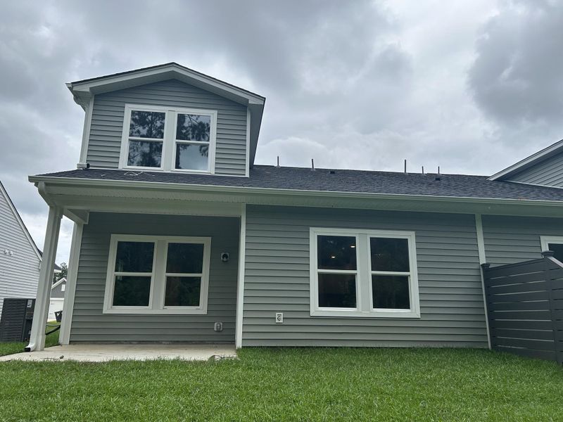 Front exterior of a new home in Hammock Walk at Nexton, Summerville, SC, highlighting curb appeal (Image 22). Front exterior of a new home in Hammock Walk at Nexton, Summerville, SC, highlighting curb appeal (Image 22).