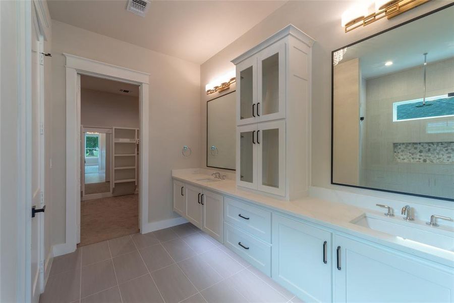 Primary bath with under counter lighting.