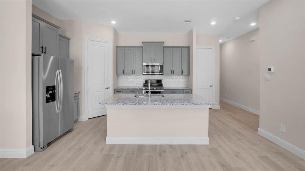 Furnished interior view inside a new home in Mustang Square, Plano (Image 8). Furnished interior view inside a new home in Mustang Square, Plano (Image 8).