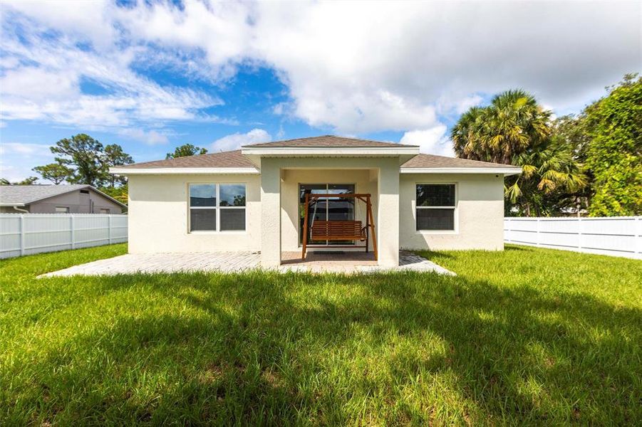 Front exterior of a new home in , Port Charlotte, FL, highlighting curb appeal (Image 1).