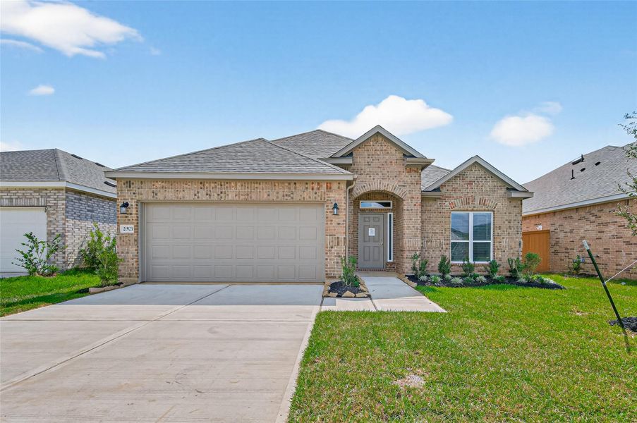 Front exterior of a new home in Cypress Green, Hockley, TX, highlighting curb appeal (Image 27).