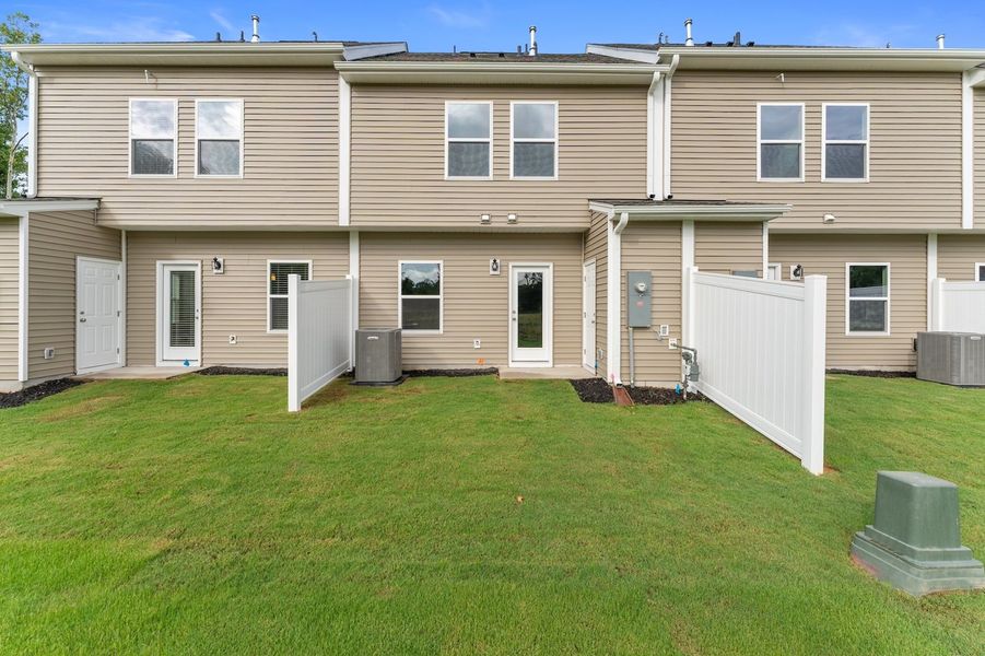 Front exterior of a new home in Edwards Station, Taylors, SC, highlighting curb appeal (Image 2). Front exterior of a new home in Edwards Station, Taylors, SC, highlighting curb appeal (Image 2).