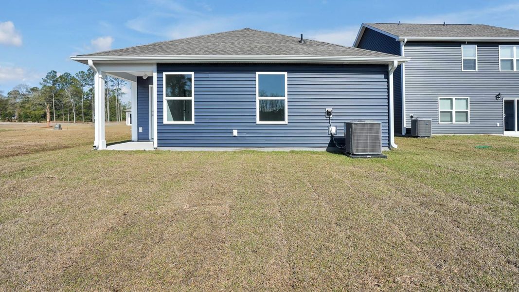 Exterior details and patio area of a home in Lockwood Landing, Supply (Image 21).