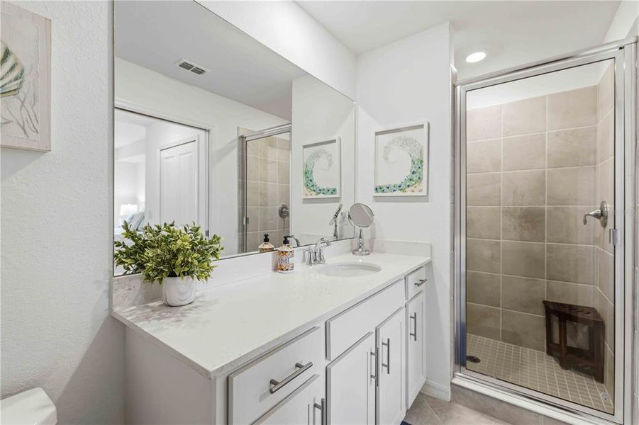 Furnished interior view inside a new home in Wellen Park Golf & Country Club, Venice (Image 22).