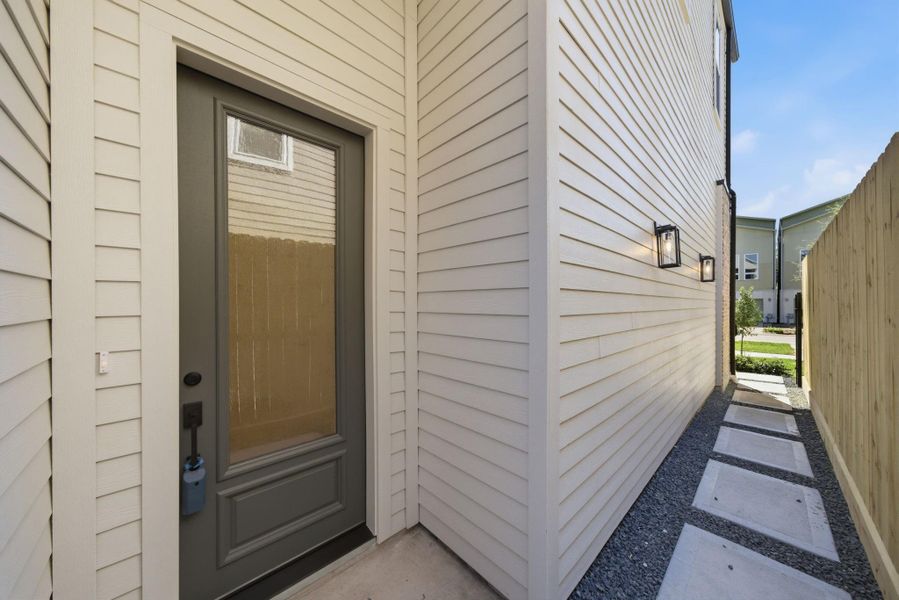 Exterior details and patio area of a home in , Houston (Image 3).