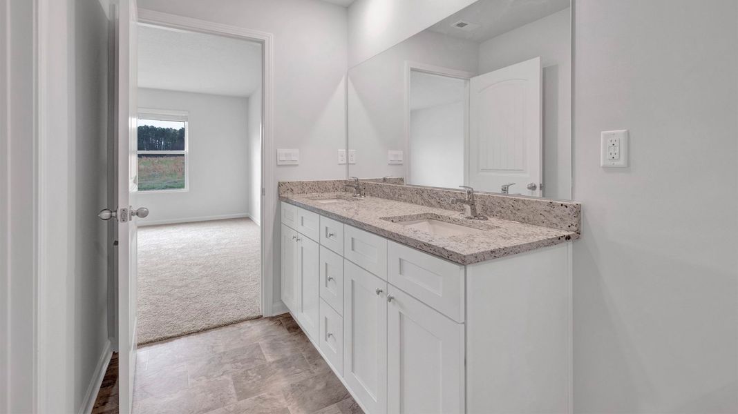 Furnished interior view inside a new home in Riggs Pointe, Millington (Image 11).