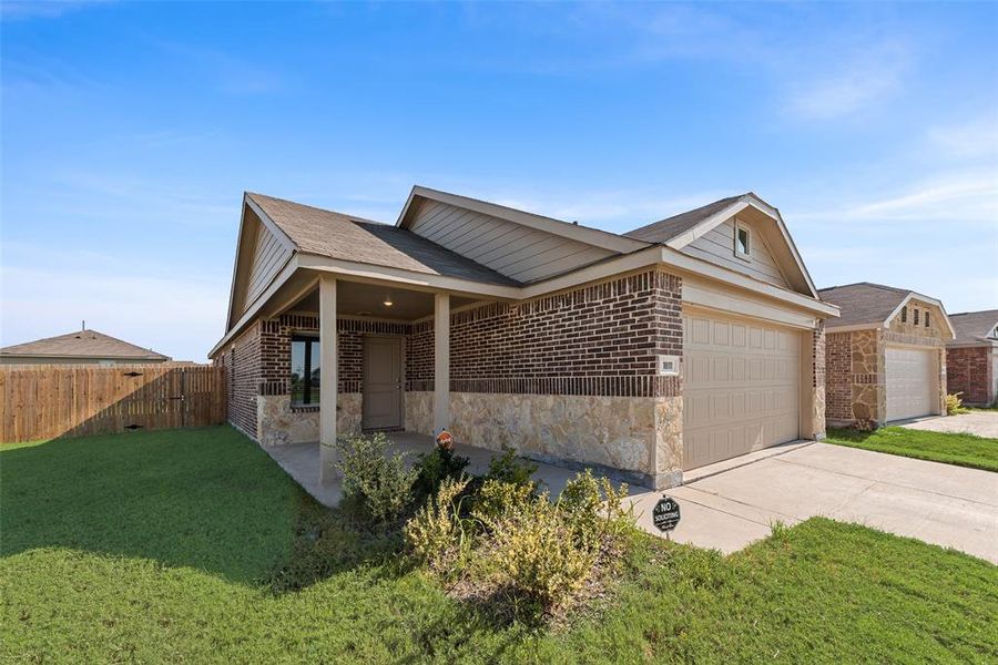 Front exterior of a new home in , Forney, TX, highlighting curb appeal (Image 14). Front exterior of a new home in , Forney, TX, highlighting curb appeal (Image 14).