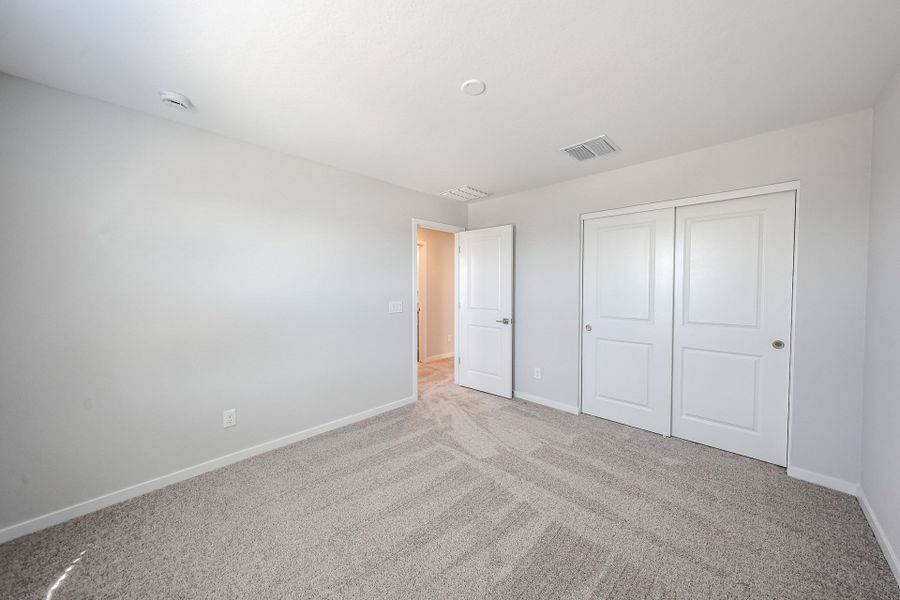 A room with white doors.