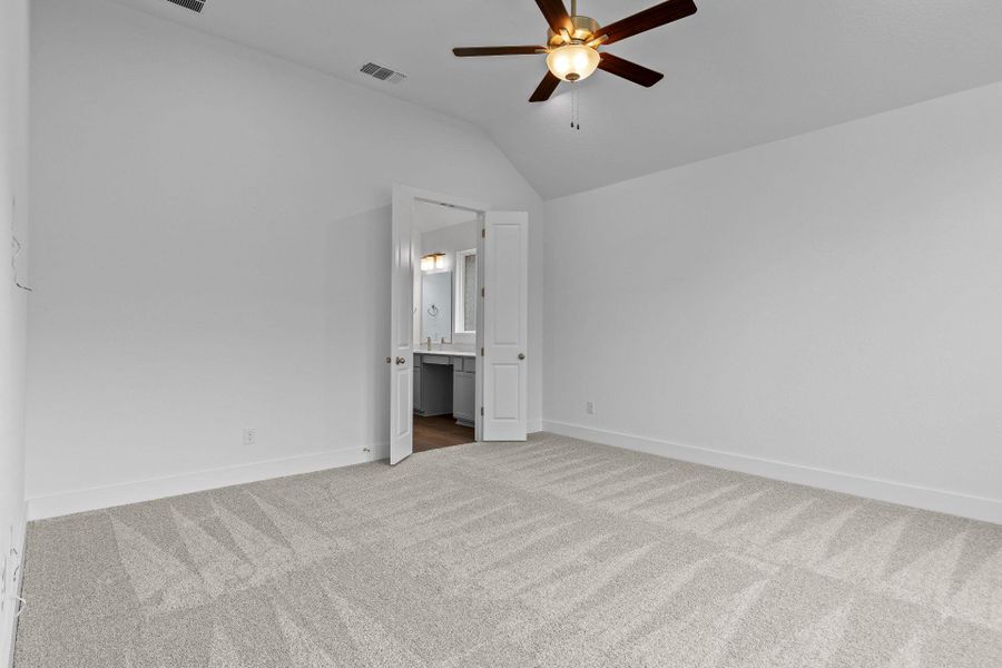 Primary Bedroom with elevated ceiling