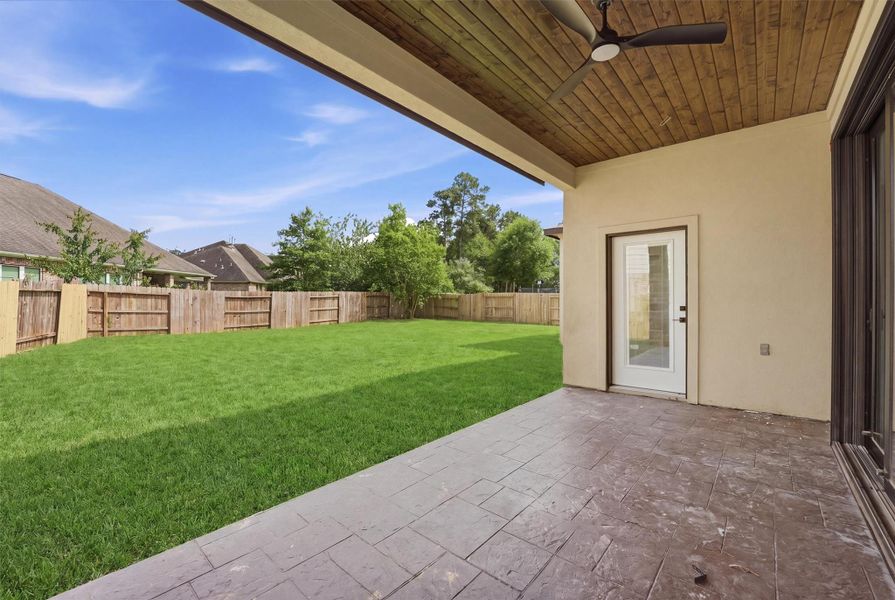 Exterior details and patio area of a home in , Conroe (Image 3).