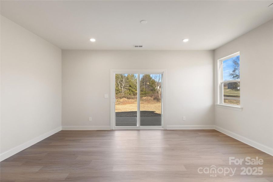 Living room area with view of back porch