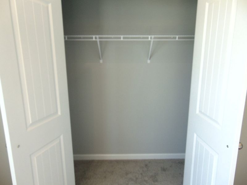 A bonus room which can be used as an extra bedroom, office, or game room. It has large windows, and a closet to store.