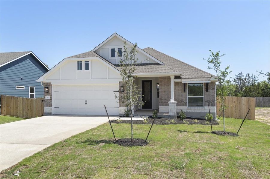 Front exterior of a new home in Grande Estates, Bertram, TX, highlighting curb appeal (Image 19).