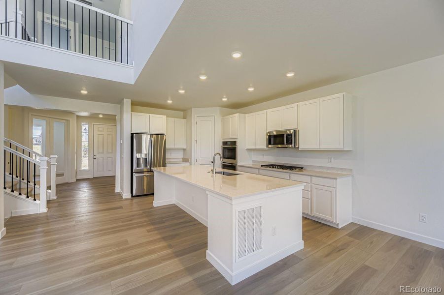 Furnished interior view inside a new home in Macanta: The Grand Collection, Castle Rock (Image 7).