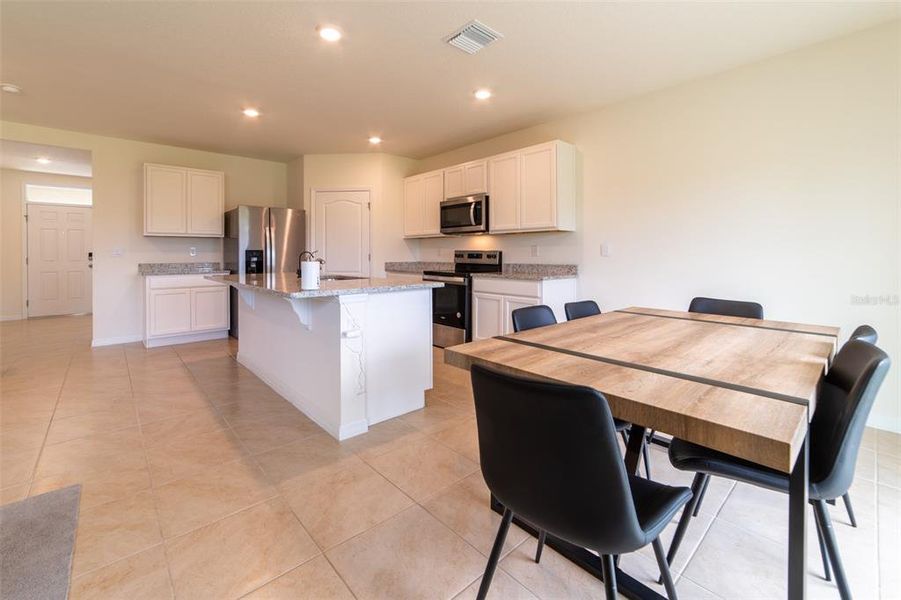 Furnished interior view inside a new home in , Harmony (Image 46).