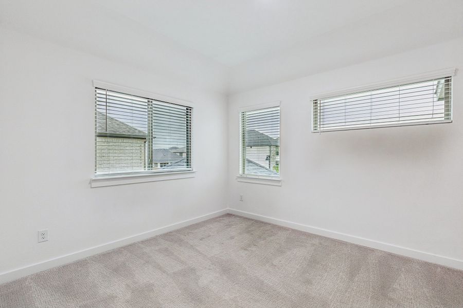 Bedroom in the Picasso II home plan by Trophy Signature Homes – REPRESENTATIVE PHOTO Bedroom in the Picasso II home plan by Trophy Signature Homes – REPRESENTATIVE PHOTO