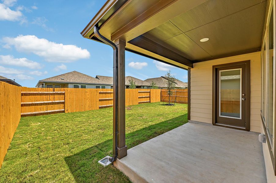 Exterior details and patio area of a home in Prairie Winds, Hutto (Image 3). Exterior details and patio area of a home in Prairie Winds, Hutto (Image 3).