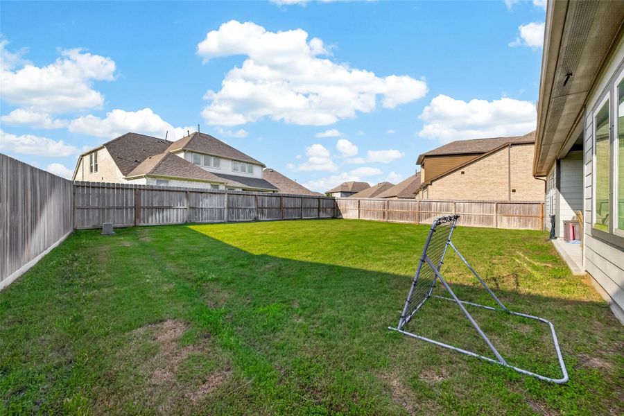 Exterior details and patio area of a home in Westland Ranch 50' Homesites, League City (Image 4).