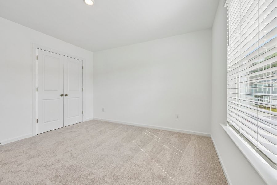 Spacious, unfurnished interior of a new home in Forestville Station, Wake Forest (Image 31).