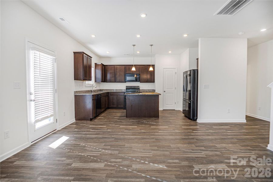 Furnished interior view inside a new home in Wilora Pond, Charlotte (Image 7).