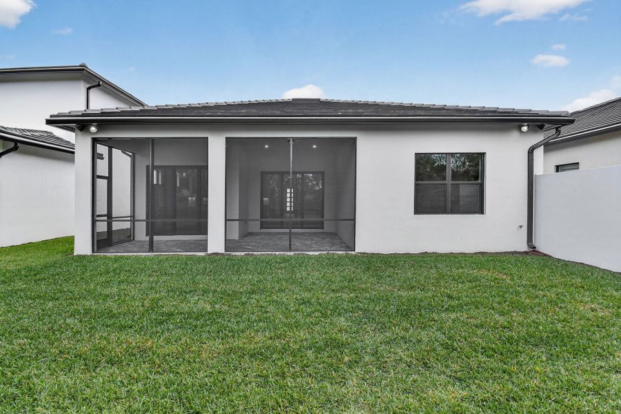 Exterior details and patio area of a home in Greyhawk Landing, Lake Worth (Image 3).