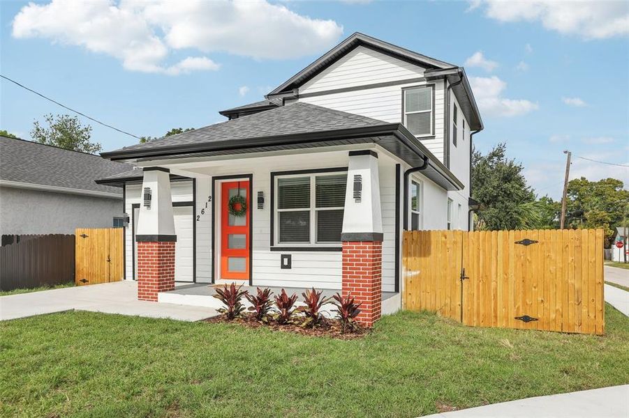 Front exterior of a new home in , Tampa, FL, highlighting curb appeal (Image 25).