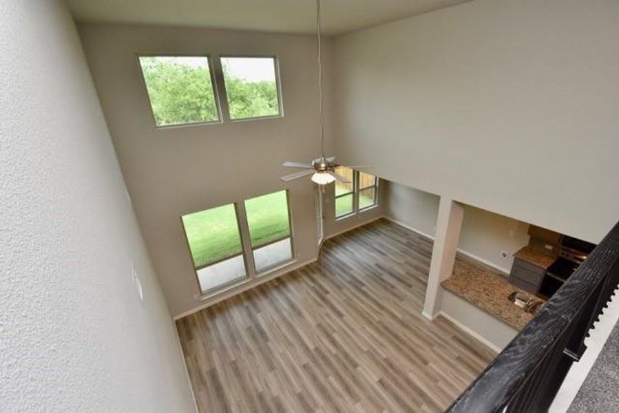 View of family room/kitchen from loft/upstairs secondary living area