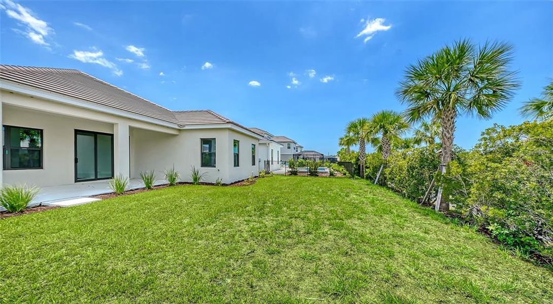 Exterior details and patio area of a home in Grand Park, Sarasota (Image 3). Exterior details and patio area of a home in Grand Park, Sarasota (Image 3).