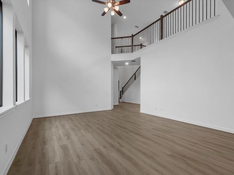 Gathering room. Sample product photo. Actual exterior and interior selections may vary by homesite. Photo may be virtually staged.