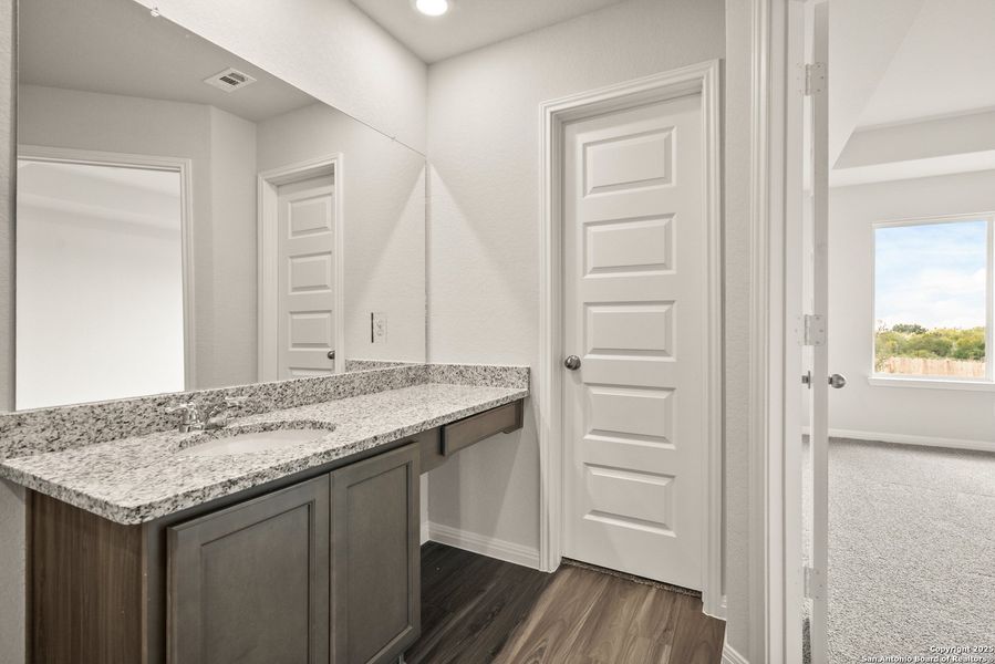 Furnished interior view inside a new home in Hunters Ranch, San Antonio (Image 8).