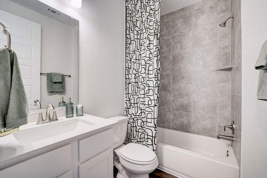 Representative furnished interior of a home built from the Comal by Pacesetter Homes in Avery Centre, Round Rock (Image 4).