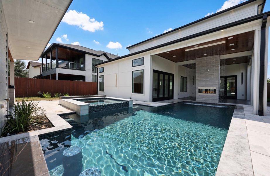 Exterior details and patio area of a home in , Houston (Image 3).