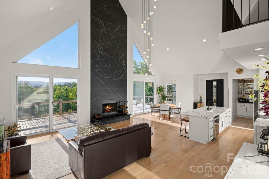 Dramatic cathedral ceiling and wood burning fireplace