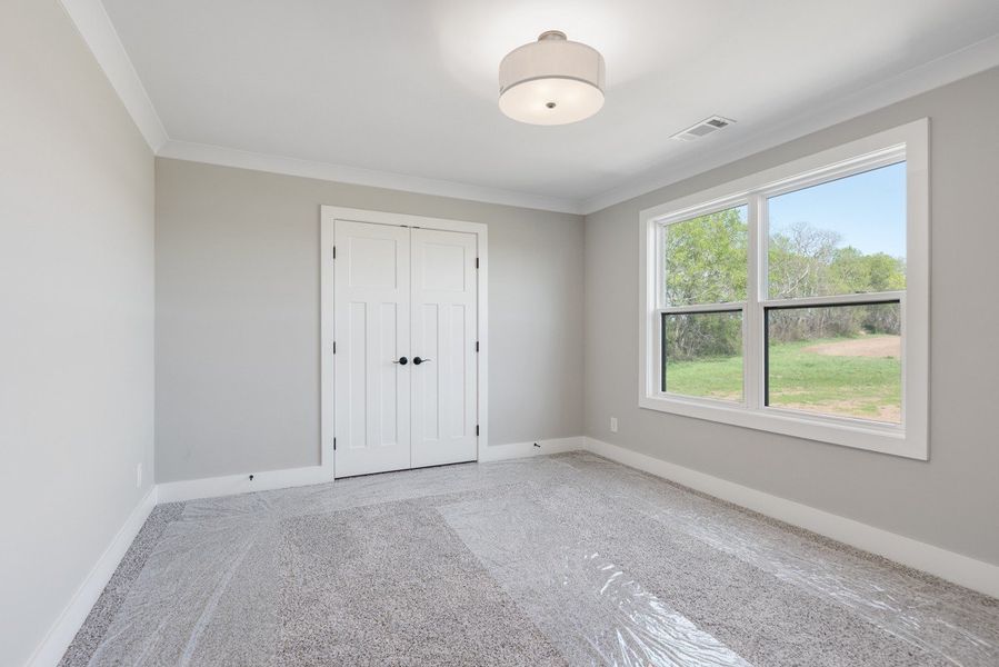 Spacious, unfurnished interior of a new home in Whisper Hill, Wendell (Image 45).
