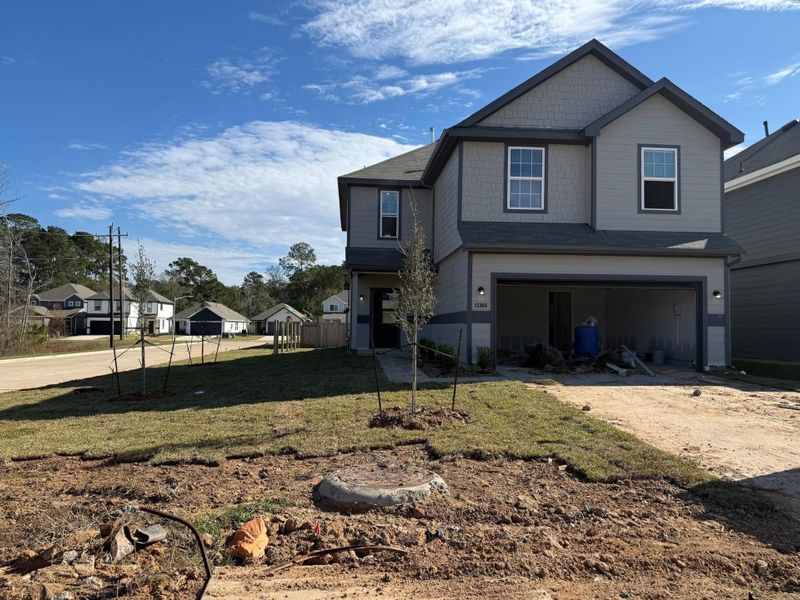 In-progress construction of a new home in River's Edge, Conroe, TX (Image 19).