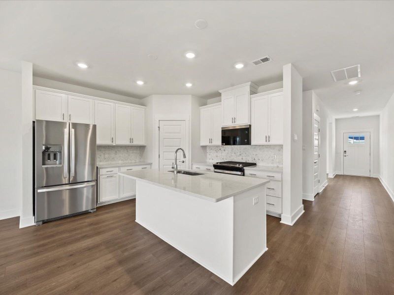 Furnished interior view inside a new home in The Coves at Lakes of Cane Bay, Summerville (Image 6). Furnished interior view inside a new home in The Coves at Lakes of Cane Bay, Summerville (Image 6).