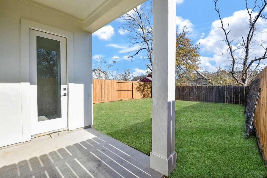 Exterior details and patio area of a home in , Houston (Image 3).