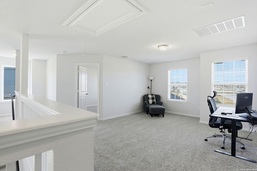 Furnished interior view inside a new home in Hunter's Ranch, San Antonio (Image 15).