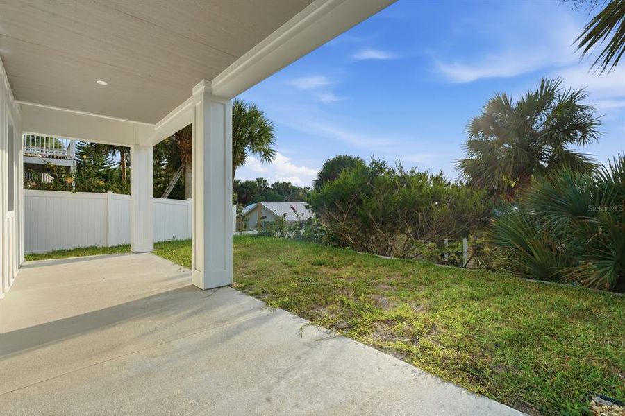 Exterior details and patio area of a home in , Flagler Beach (Image 38).
