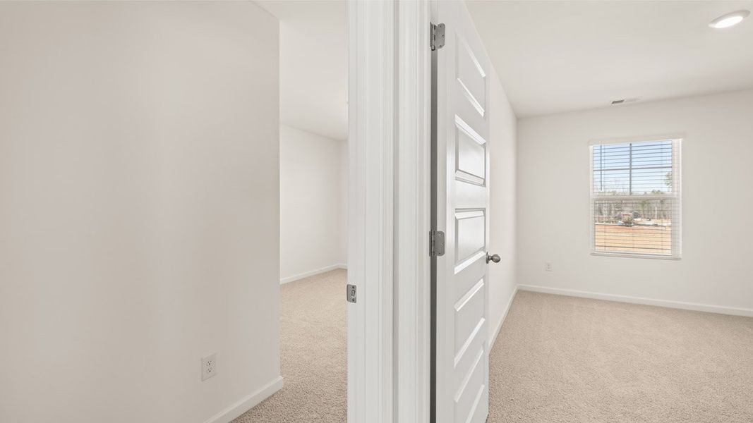 Representative unfurnished interior of a home built from the Aisle by D.R. Horton in Shoal Creek, Hampton (Image 21).