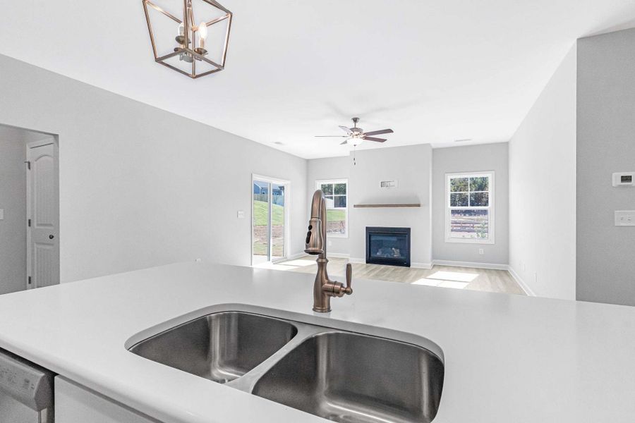 Representative furnished interior of a home built from the Weymouth by Caviness & Cates Communities in Bartlett Manor, Youngsville (Image 126).
