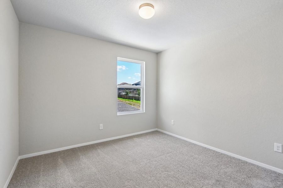 Spacious, unfurnished interior of a new home in Hunters Ranch, San Antonio (Image 23).