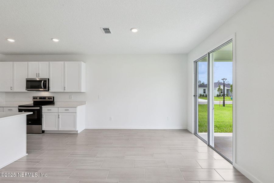 Spacious, unfurnished interior of a new home in Flagler Village - Signature Series, Palm Coast (Image 16).