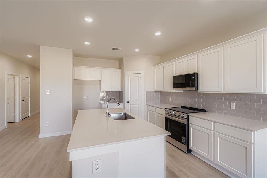 Furnished interior view inside a new home in MiraVerde, Crowley (Image 5).