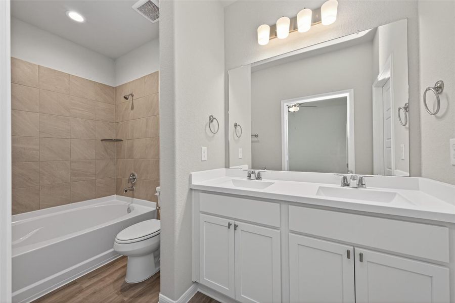 Furnished interior view inside a new home in Woodland Lakes, Houston (Image 9).