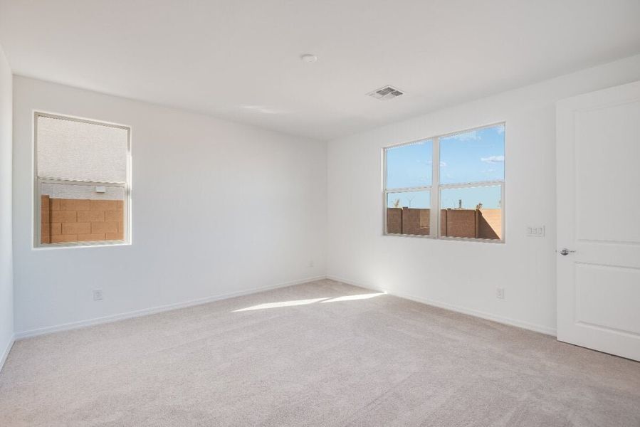Spacious, unfurnished interior of a new home in Artisan at Asante, Surprise (Image 13).