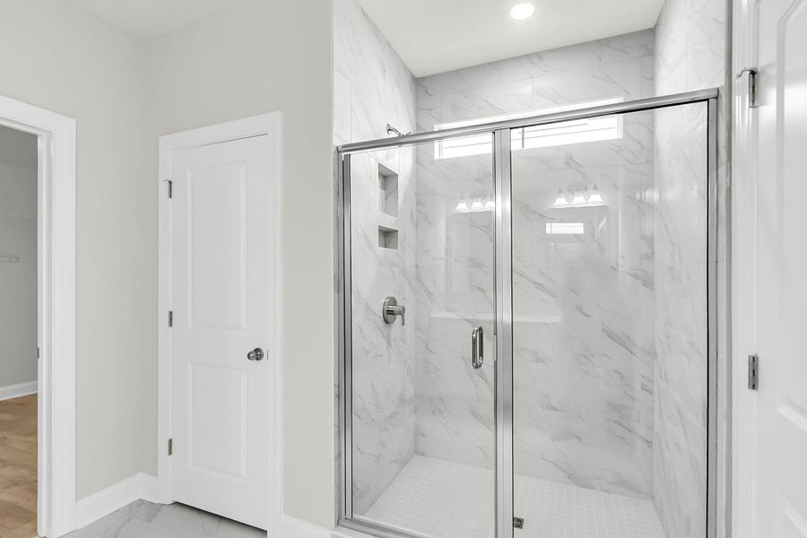 Furnished interior view inside a new home in Tidewater at Lakes of Cane Bay, Summerville (Image 8).
