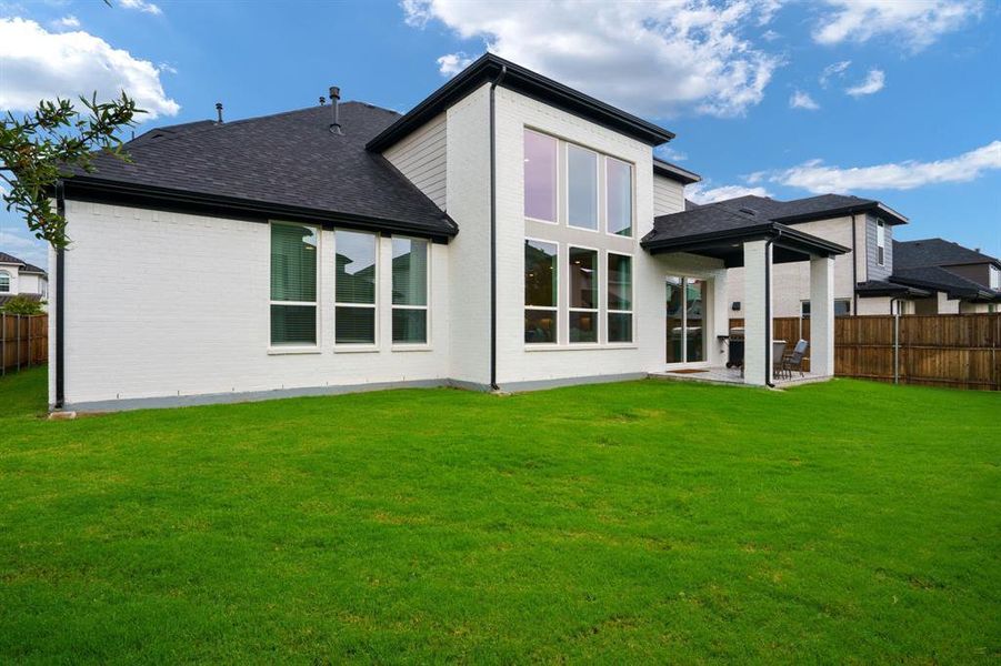Front exterior of a new home in , Frisco, TX, highlighting curb appeal (Image 1). Front exterior of a new home in , Frisco, TX, highlighting curb appeal (Image 1).
