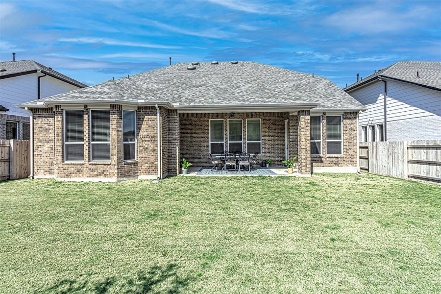 Exterior details and patio area of a home in Flora, Hutto (Image 29).
