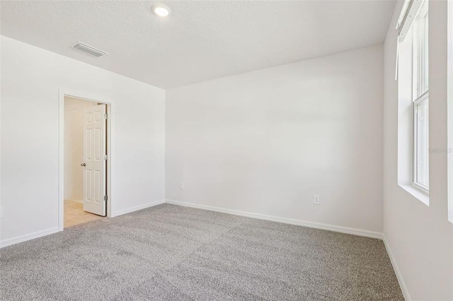 Spacious, unfurnished interior of a new home in Bradbury Creek - Signature Series, Haines City (Image 23).